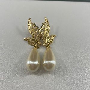 Gold and white studded earrings
